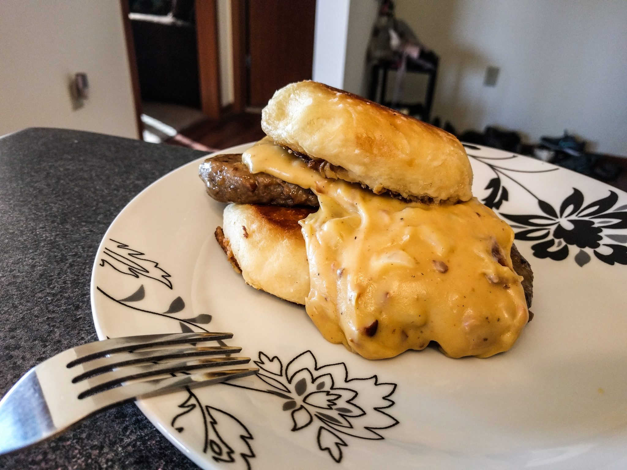 Wisconsin Biscuits and Gravy with pretzel biscuits and beer cheese sauce.