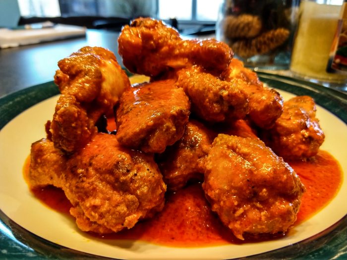 a plate of baked buffalo wings 