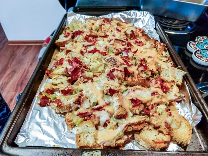 Reuben nachos ready cooked and dressed with 1000 island