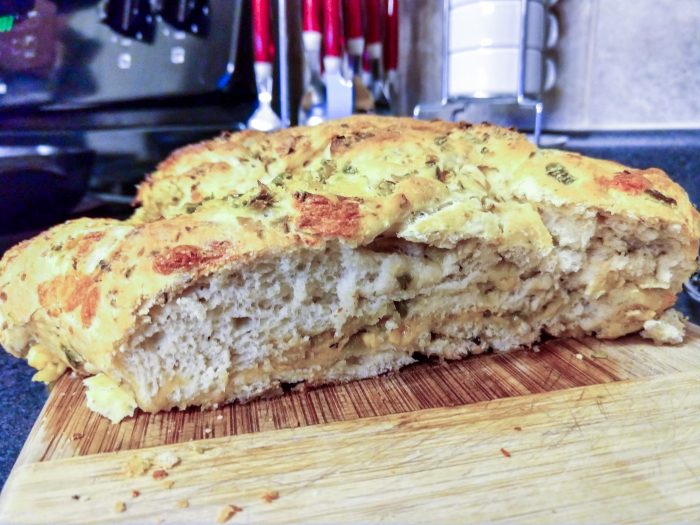 Loaf of jalapeno olive cheddar cheese bread