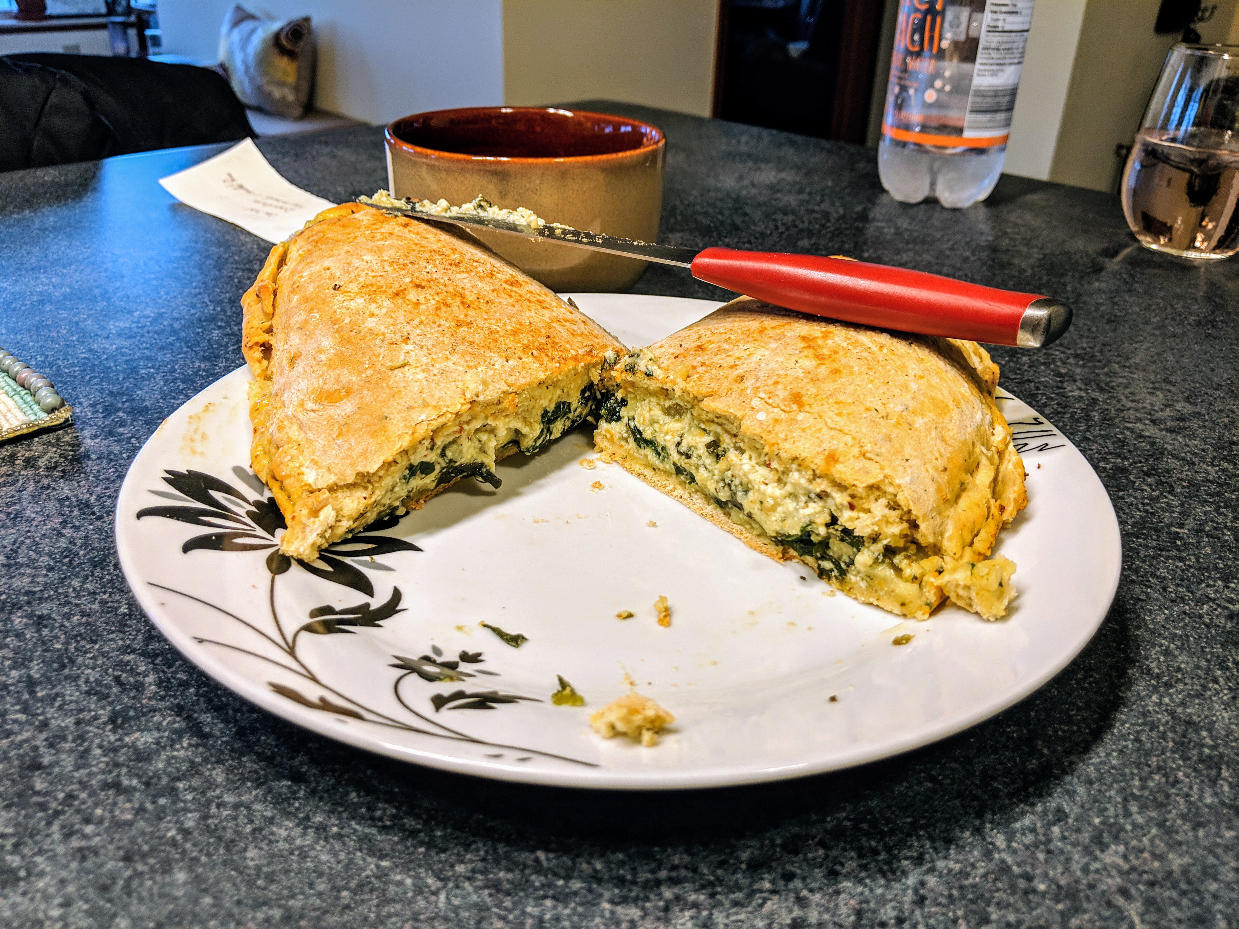 a giant spinach calzone