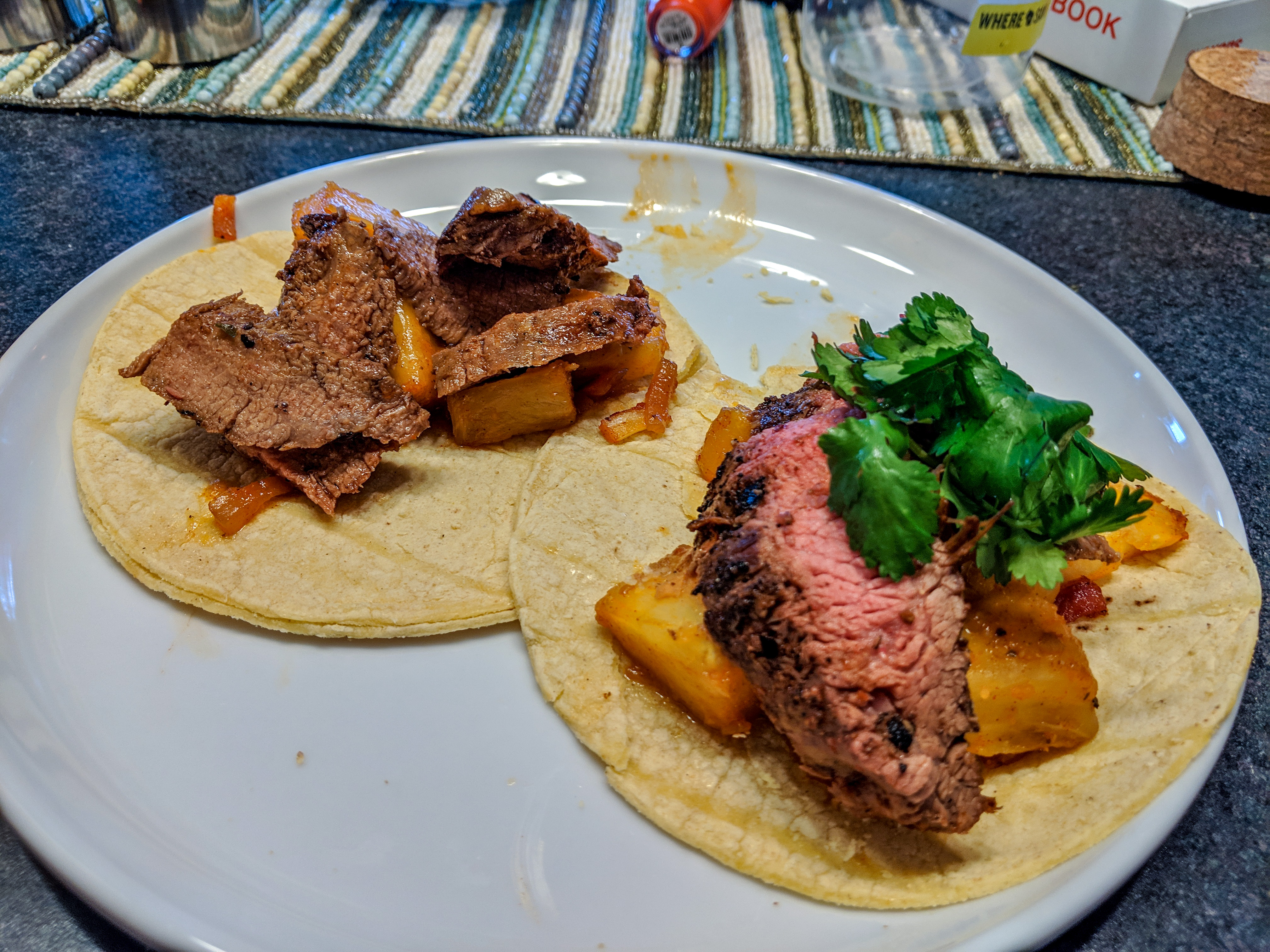 a steak taco with pineapples