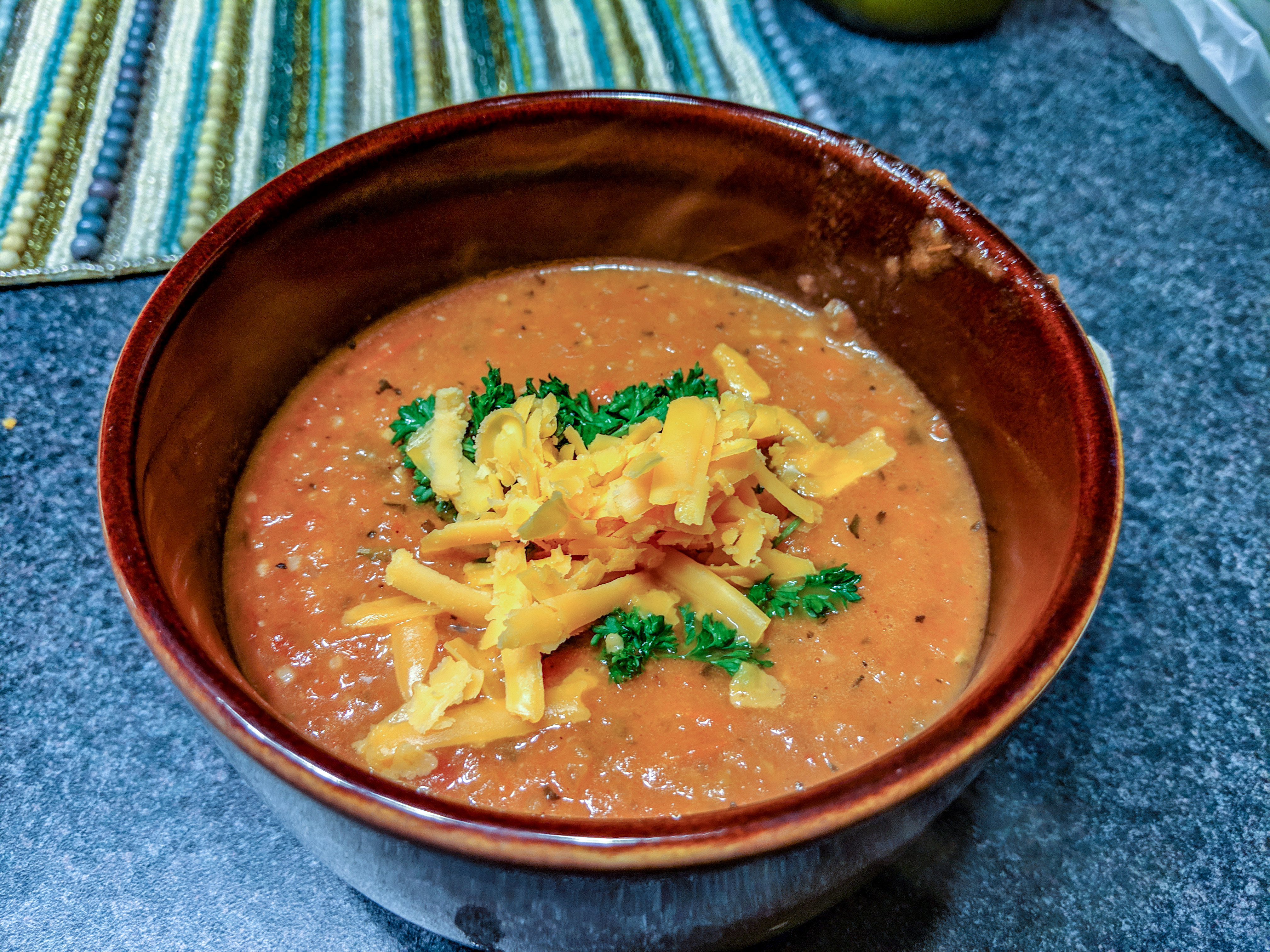 a bowl of hearty tomato soup